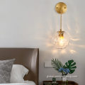China Copper wall lamp with suspended grain glass ball Manufactory